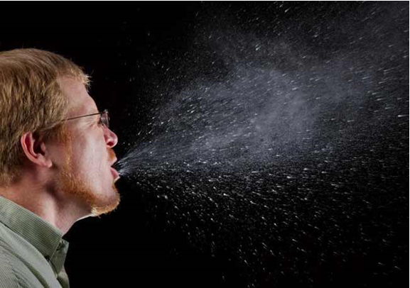 Photo of man's sneeze - droplet plume